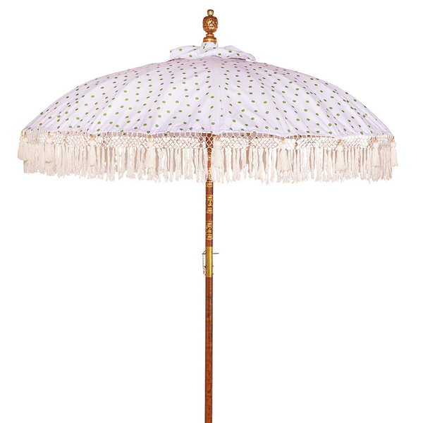 Grace Round Bamboo Parasol is elegant white canopy with green polka dots. Yellow threading inside and bamboo spokes. The pole is made from hand-carved durian wood pole with gold paint and finial, the pole join and pegs are made from solid brass. The fringing is in white with sophisticated white tassels and beading.