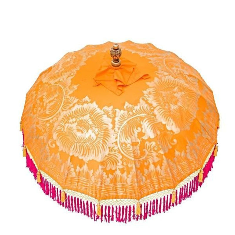 Etta. Vibrant orange Bali garden parasol, artisan painted with gold and with handmade pink fringing. The most beautiful garden umbrella and summer accessory. Perfect for patios, pools, picnics and weddings. The ultimate stylish garden decoration, luxurious, colourful and handmade.
