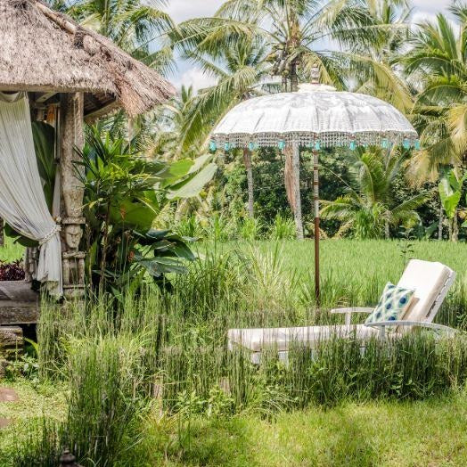 Cher Round Bamboo Parasol beautiful cream, silver and blue garden parasol. Hand-painted with silver ink by artisans in Bali. The pole is made from hand-carved durian wood pole with silver paint and finial, the pole join and pegs are made from solid brass.