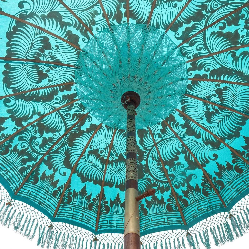 East London Parasol Bette- blue twill Bali bamboo 2m garden umbrella with lotus design hand painted in gold ink. Tassels in shades of blue, hand made. The perfect umbrella for picnics, gardens, summer, patios, pool side and terraces. A very pretty parasol and colourful, luxurious garden decoration for a fabulous summer.