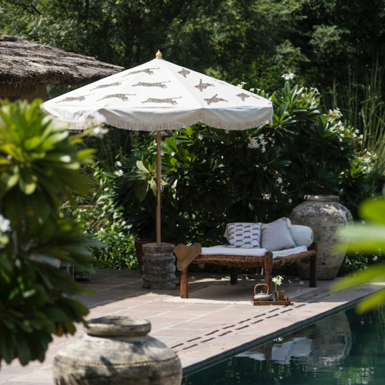 Leopard Print cushion that words wonderfully with our leopard print parasol, Gloria. Handcrafted for a unique take on a classic parasol. Everything has been hand block printed.