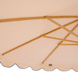 Blue Holly - Handcrafted frame made in the UK. Beautiful plain natural white parasol with blue scallop edged. Simple, chic and elegant. FSC certified ash frame made in Hampshire with our own designs of brass fittings and pulleys. A parasol perfect for a picnic, patio, through your table with an umbrella hole or by your sun lounger at the pool.