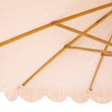Molly Octagonal Parasol - Handcrafted frame made in the UK. Bold stripe pattern canvas with scalloped edges and a cream interior. FSC certified ash frame made in Hampshire with our own designs of brass fittings and pulleys. A parasol perfect for a picnic, patio, through your table with an umbrella hole or by your sun lounger at the pool.
