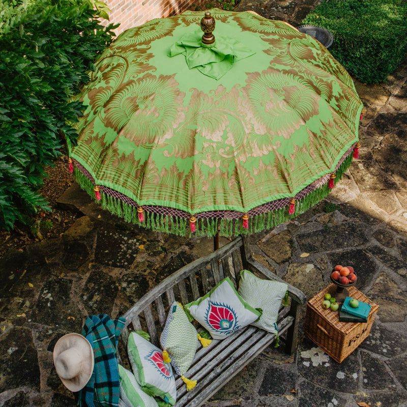 Lime and pink garden decoration, East London Parasol Company Jane parasol and Lime Suzani cushions