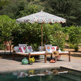 3m William Morris print luxury garden umbrella with scalloped edges. Perfect show stopping beautiful umbrella for an elegant garden or pool. Intricately printed and a gorgeous wooden frame, the ultimate in gorgeous garden decoration. The most beautiful summer accessory for a party, dining table, wedding and sunlounger. In the 2020 Liberty print trend.