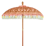 Rosanna Round Bamboo Parasol's canopy is a gorgeous pastel pink with lotus design hand-painted in gold ink. Inside the threading is light yellow, and the fringe is a combination of mint green and light yellow tassels. The pole is made from hand-carved durian wood pole with gold paint and finial, the pole join and pegs are made from solid brass.