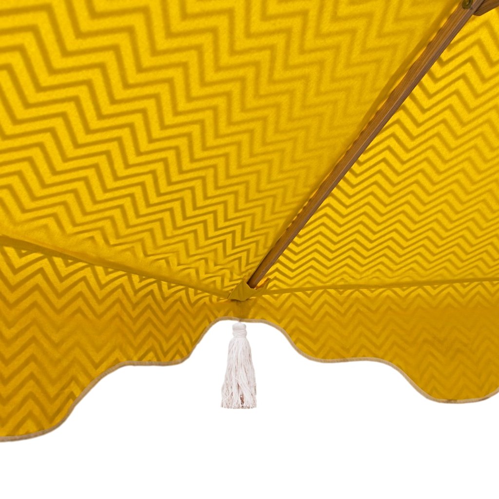 East London Parasol Company wooden frame Big Aretha umbrella or garden parasol. Grey zigzags chevrons with yellow and natural cotton tassles