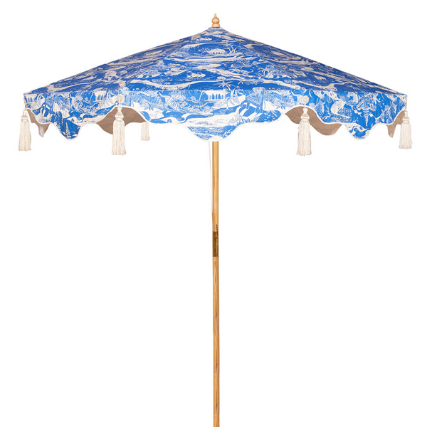 Handcrafted frame made in the UK. Natural cotton canvas with printed blue and white East London Parasol Company's story outside and white inside, and scalloped valance- in collaborated with V&A exhibited British artist Harriet Popham.