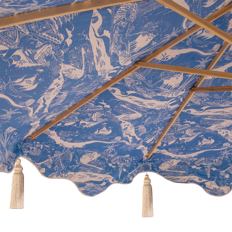 Willow 2 Octagonal Parasol - Natural cotton canvas with printed blue and white East London Parasol Company's story outside and white inside, and scalloped valance- in collaborated with V&A exhibited British artist Harriet Popham. This is a narrative design inspired by willow pattern and chinoiserie. 