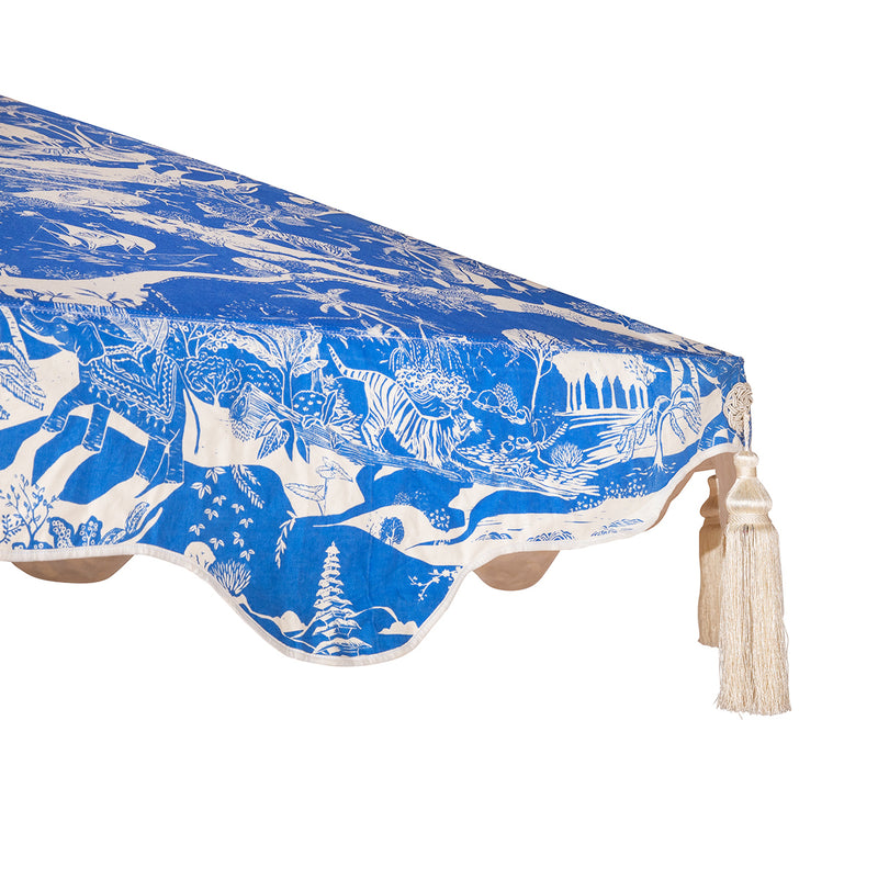 Handcrafted frame made in the UK. Natural cotton canvas with printed blue and white East London Parasol Company's story outside and white inside, and scalloped valance- in collaborated with V&A exhibited British artist Harriet Popham. 