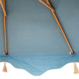 Inside the canopy of Blue Aretha Octagonal Parasol. Sustainanle FSC ash wood handmade frames in the UK. White tassels and beautiful valance along the bottom of the canopy