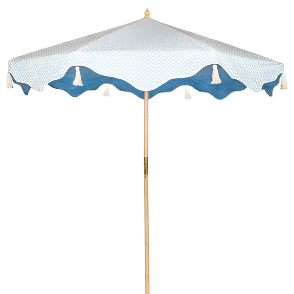 Blue Aretha Octagonal Parasol, with blue and white canopy and block blue on the underside. This is the perfect parasol for any occasion and will brighten up any space.