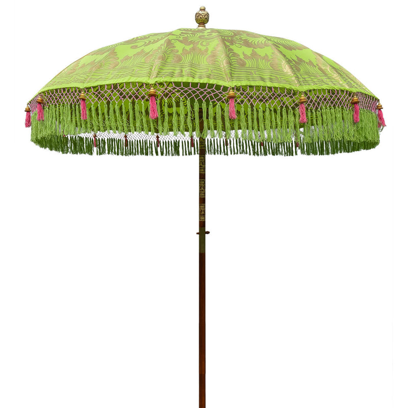 Jane Round Bamboo Parasol - Light lime green twill with lotus design hand-painted in gold ink. Matching green threading and bamboo spokes. The pole is made from hand-carved durian wood pole with gold paint and finial, the pole join and pegs are made from solid brass. Fringing in shades of green with bright light pink tassels.