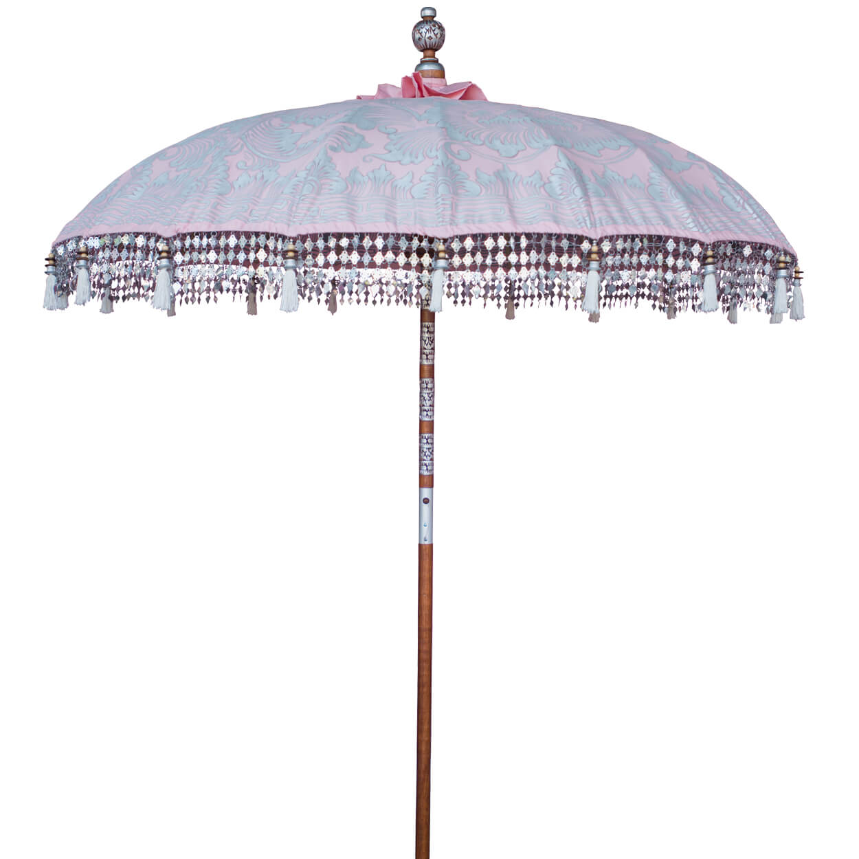 Stevie Round Bamboo Parasol- Pale pink twill garden parasol with floral design hand painted in silver ink. The pole is made from hand-carved durian wood pole with silver paint and finial, the pole join and pegs are made from solid brass with white threading, bamboo spokes.