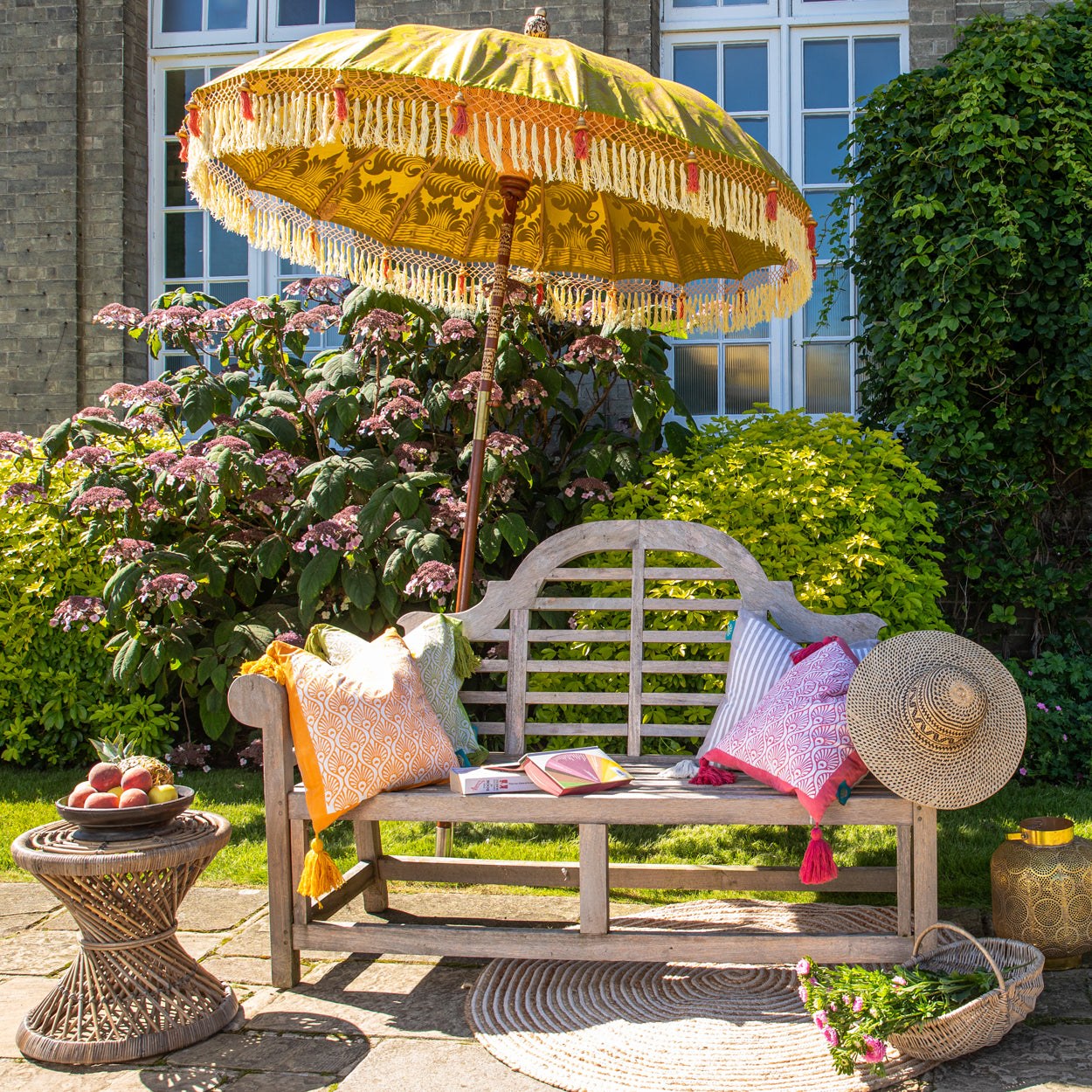 Coral threading inside and bamboo spokes. The pole is made from hand-carved durian wood pole with gold paint and finial, the pole join is made from solid brass. The fringing is in cream with elegant coral tassels and gold beading.