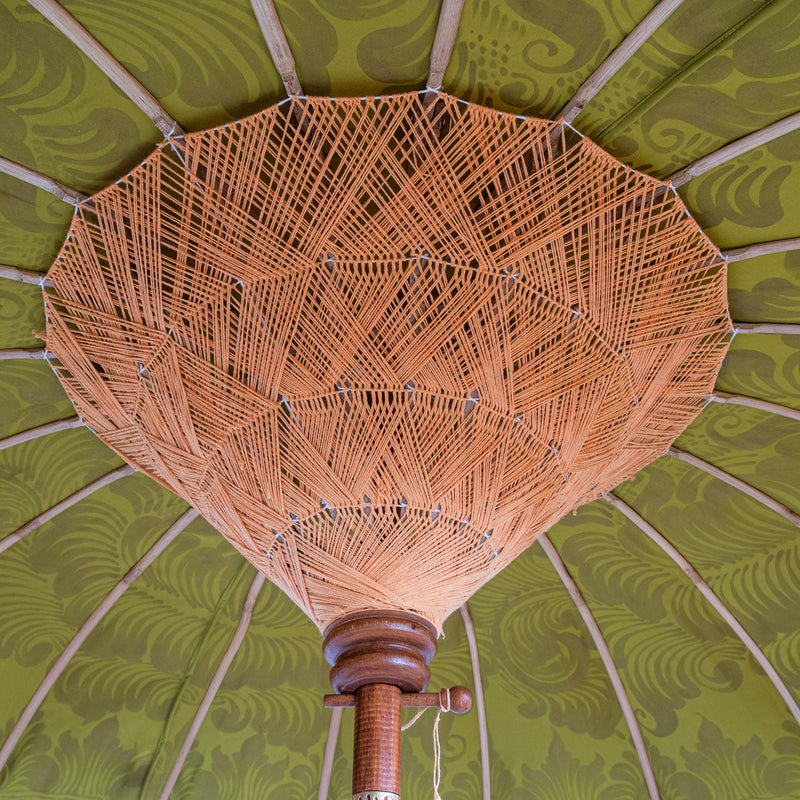Coral threading inside and bamboo spokes. The pole is made from hand-carved durian wood pole with gold paint and finial, the pole join is made from solid brass. The fringing is in cream with elegant coral tassels and gold beading.